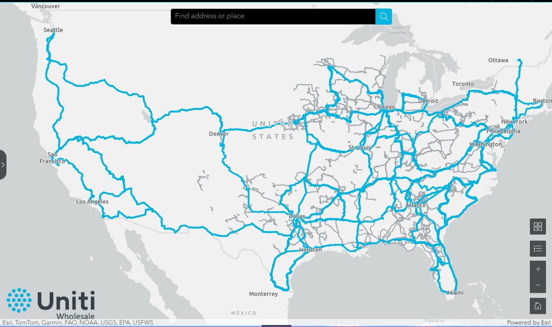 A map of the United States showing Uniti Wholesale’s network coverage, highlighted in blue lines, spanning major cities and regions across the country. The Uniti logo appears in the bottom-left corner.